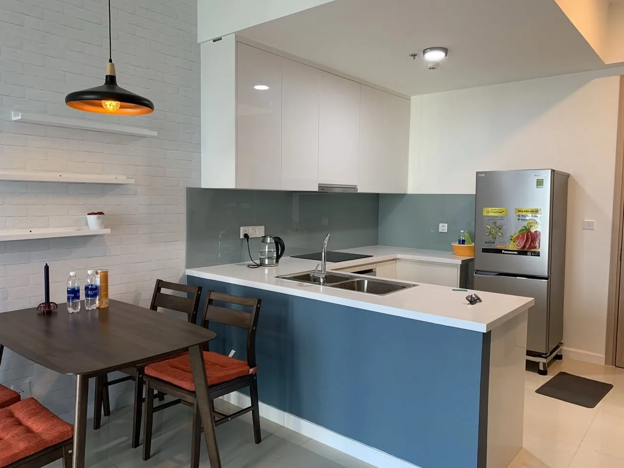 Estella Heights 1BR With Blue Accent Interiors and an Open Kitchen