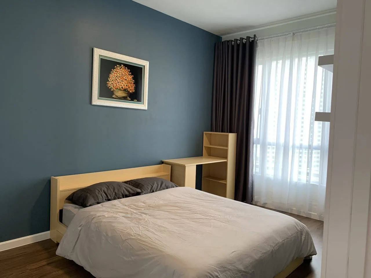 Estella Heights 1BR With Blue Accent Interiors and an Open Kitchen