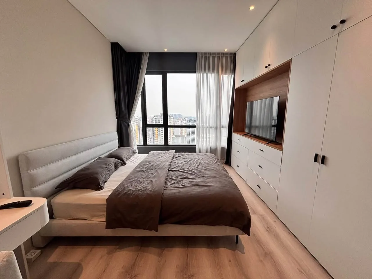 Estella Heights 2BR With Light Wood Interiors, Balcony and Bathtub